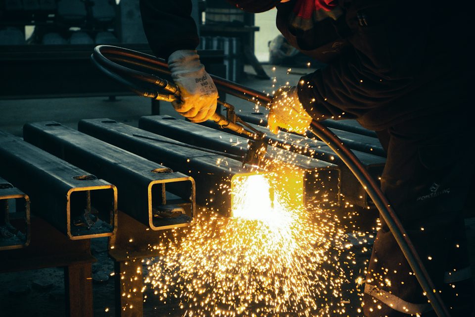 Welder fabricating a steel structure