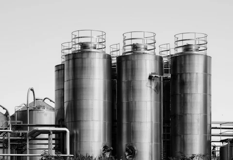 Stainless-steel storage tanks with access platforms