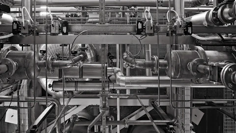 Network of process pipes and valves in a plant