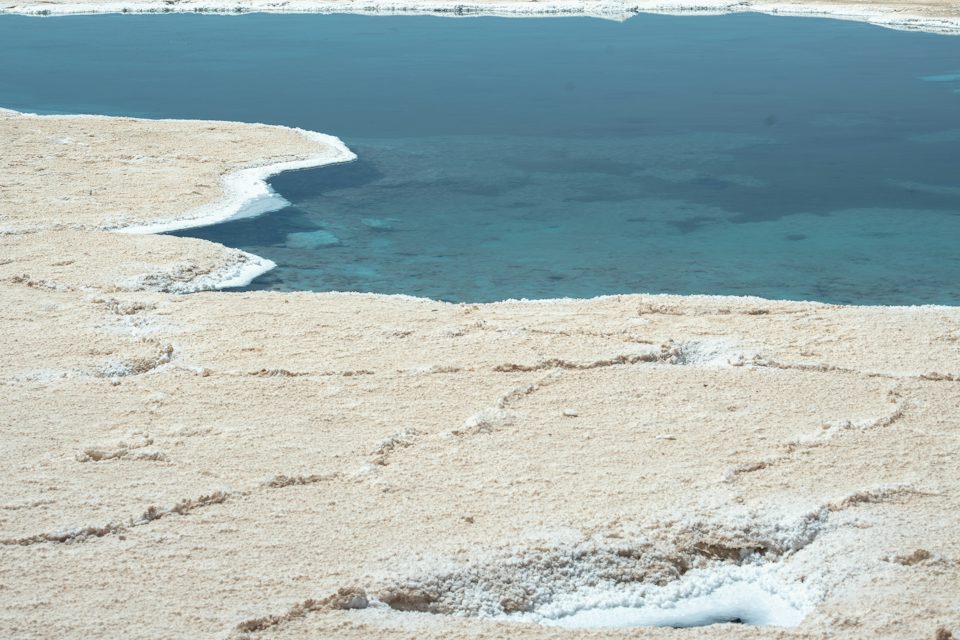Salt flats beside a mineral lake